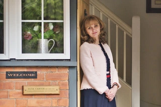 Elva Carter leant against the entrance door to her therapy room.