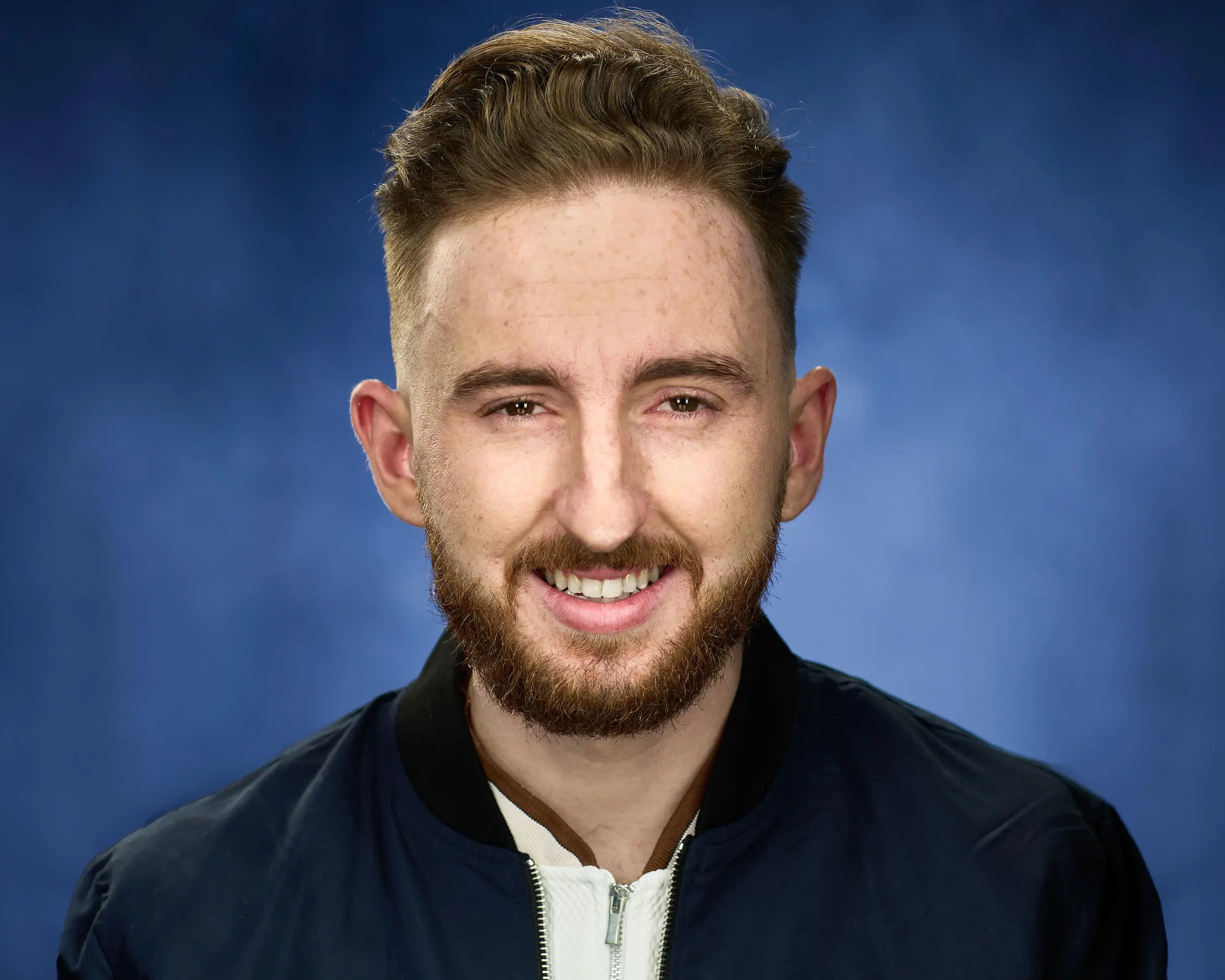 Headshot of Sam, a male client at Positive Change Therapies.